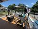 Inviting deck features cozy furniture, including a sofa, swinging egg chair and a gazebo, perfect for relaxing or entertaining at 533 Tuckers Grove Rd, Statesville, NC 28625