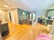 Inviting dining area with hardwood floors, neutral walls, and a view into the kitchen at 533 Tuckers Grove Rd, Statesville, NC 28625