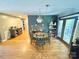 Charming dining area with hardwood floors and a view into the kitchen and living area at 533 Tuckers Grove Rd, Statesville, NC 28625