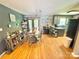 Open floor plan with eat in dining and access to the back yard and kitchen at 533 Tuckers Grove Rd, Statesville, NC 28625