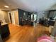 Spacious dining room with wooden floors, a stylish table set, and an inviting atmosphere for Gathering gatherings and meals at 533 Tuckers Grove Rd, Statesville, NC 28625