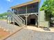 Home exterior with multi-level deck and under-house parking at 533 Tuckers Grove Rd, Statesville, NC 28625