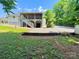 Exterior showcasing multi-level deck with backyard access and under-house storage at 533 Tuckers Grove Rd, Statesville, NC 28625