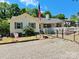 Charming home featuring an American flag, inviting front porch and lovely landscaping at 533 Tuckers Grove Rd, Statesville, NC 28625