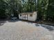 A storage shed offers additional space for tools and equipment at 533 Tuckers Grove Rd, Statesville, NC 28625