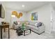 Cozy living room with a comfortable sectional sofa, decor, and modern furnishings at 7148 Hodges Meadow Ln, Charlotte, NC 28213