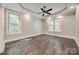 Spacious bedroom with hardwood floors, recessed lighting, and a ceiling fan at 7435 Hammond Dr, Charlotte, NC 28215