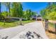 This home features a manicured lawn, and a two-car garage at 7435 Hammond Dr, Charlotte, NC 28215