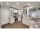 Well-lit kitchen featuring stainless steel appliances and granite countertops at 7435 Hammond Dr, Charlotte, NC 28215