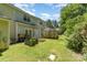 Spacious backyard with a garden and wooden fence, perfect for outdoor activities at 7504 Petrea Ln, Charlotte, NC 28227