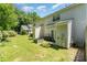 This lovely backyard is complete with lush green grass, a garden, and a cozy atmosphere at 7504 Petrea Ln, Charlotte, NC 28227