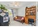 Bright bedroom with a futon couch at 7504 Petrea Ln, Charlotte, NC 28227