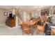 The dining space has stairs leading to the second floor and a piano at 7504 Petrea Ln, Charlotte, NC 28227
