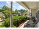 Inviting front porch with seating area and view of the landscaped yard at 7504 Petrea Ln, Charlotte, NC 28227
