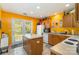 Bright kitchen featuring an island and stainless steel appliances at 7504 Petrea Ln, Charlotte, NC 28227
