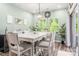 Bright dining room with a large table and chairs, perfect for Gathering meals and gatherings at 7530 Porrera St, Charlotte, NC 28214