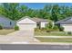 Inviting single-Gathering home with a manicured lawn, two-car garage, and a lovely landscaped front yard at 7530 Porrera St, Charlotte, NC 28214