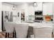 Well-equipped kitchen with stainless steel appliances and a spacious island with barstool seating at 7530 Porrera St, Charlotte, NC 28214