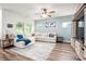 Spacious living area with a large sectional sofa, offering comfortable seating and relaxation at 7530 Porrera St, Charlotte, NC 28214