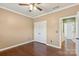 Neutral bedroom featuring hardwood floors, a spacious closet, and fresh paint at 8406 Flint Hill Dr, Charlotte, NC 28273
