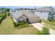 Beautiful single-story home with a well-manicured lawn and a two-car garage in a residential neighborhood at 8406 Flint Hill Dr, Charlotte, NC 28273