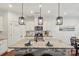 Well-lit kitchen with a granite island, stainless steel appliances, and pendant lighting at 8406 Flint Hill Dr, Charlotte, NC 28273