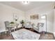 Bright office space with neutral tones, a desk, and comfortable seating at 8493 Twickenham Ter, Harrisburg, NC 28075
