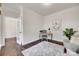 Bright office space with neutral tones, a desk, and comfortable seating at 8493 Twickenham Ter, Harrisburg, NC 28075