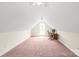 Expansive bonus room featuring carpet floors, lots of natural light and desk with monitor at 8717 Swift Rd, Oakboro, NC 28129