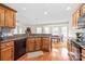 Kitchen area with granite countertops and stainless steel appliances offering ample storage space at 8717 Swift Rd, Oakboro, NC 28129