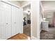 Hallway leading to room with exercise bike at 8938 Glencroft Rd, Mint Hill, NC 28227
