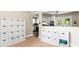 Bright living space featuring organized storage, an open doorway to the kitchen and natural light at 8938 Glencroft Rd, Mint Hill, NC 28227