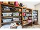 Shelving with items for storage and organization at 8938 Glencroft Rd, Mint Hill, NC 28227