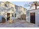 Private backyard includes patio, storage shed, and convenient access to the home at 9464 Lexington Cir # B, Charlotte, NC 28213