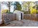 Enclosed backyard with privacy fence, storage shed, patio and mature trees providing shade at 9464 Lexington Cir # B, Charlotte, NC 28213