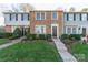 A charming townhome featuring a brick facade, well-maintained landscaping, and a welcoming front entrance at 9464 Lexington Cir # B, Charlotte, NC 28213