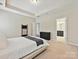 Comfortable bedroom with neutral colors, featuring carpet floors and a serene atmosphere at 9507 Reid Hall Ln, Matthews, NC 28105