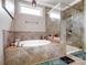 Bathroom featuring a soaking tub with tile surround and glass enclosed shower at 1006 Wellington Ave, Indian Land, SC 29707