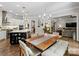 Open-concept layout with a dining area, kitchen, and living room for easy entertaining at 1006 Wellington Ave, Indian Land, SC 29707