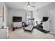 Home gym featuring a treadmill, exercise bike, and TV, perfect for staying active at 1006 Wellington Ave, Indian Land, SC 29707