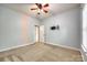 Bedroom with neutral carpet, a ceiling fan, and a television mount at 10407 Alvarado Way, Charlotte, NC 28277