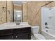 Full bathroom featuring vanity with a white countertop and dark brown cabinets at 11052 Preservation Park Dr, Charlotte, NC 28214