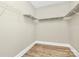 Walk-in closet providing ample storage space with metal shelving at 11052 Preservation Park Dr, Charlotte, NC 28214