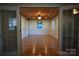 Bright living room with hardwood floors, a ceiling fan, and ample natural light at 1109 Edwards St, Rock Hill, SC 29732