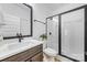 Bathroom features a tiled shower with sliding glass door, modern vanity, and clean finishes at 1149 Rosecliff Dr, Waxhaw, NC 28173