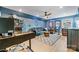 Stylish game room boasts a leather couch, barrel tables, and unique decor at 1149 Rosecliff Dr, Waxhaw, NC 28173