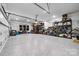 Spacious garage with epoxy flooring and ample storage shelves and organization at 1149 Rosecliff Dr, Waxhaw, NC 28173