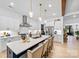 Spacious kitchen with large island, pendant lighting, stainless steel appliances, and barstool seating at 1149 Rosecliff Dr, Waxhaw, NC 28173