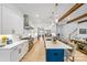 Beautiful kitchen with white cabinets, a large island, stainless appliances, and hardwood flooring at 1149 Rosecliff Dr, Waxhaw, NC 28173