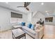 Comfortable living room with a ceiling fan, ample natural light, and cozy seating at 1149 Rosecliff Dr, Waxhaw, NC 28173